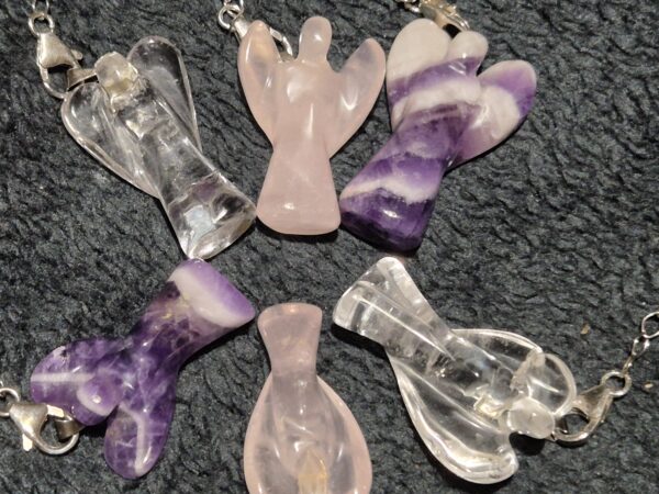 Pendule ange quartz rose